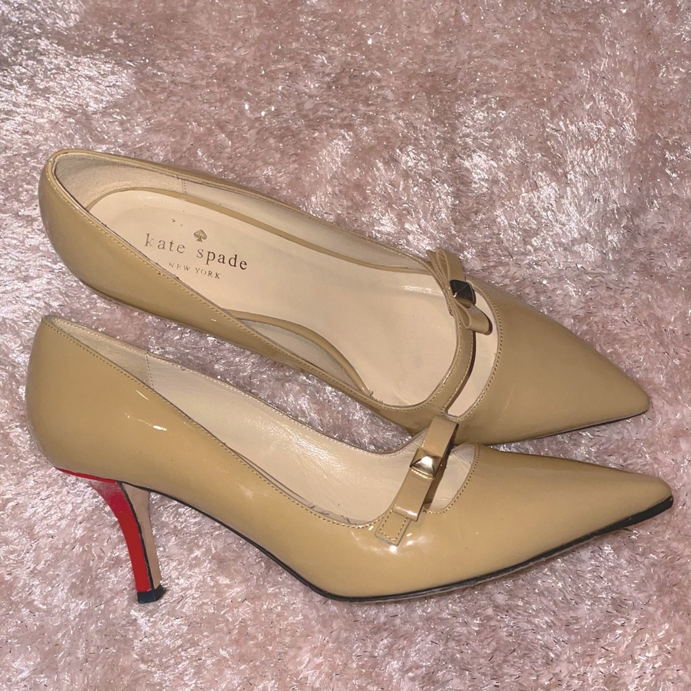 Kate Spade Nude Patent Leather pumps with red heel